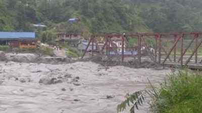 Rain-triggerd flood damages Fatte Bridge in Melamchi