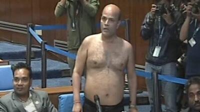 Lawmaker Singh undresses in protest at parliament