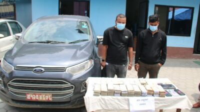 Two arrested with Rs 9.8 million from Durbar Marg