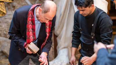 Prince Edward tries his hand at wood carving in Bhaktapur