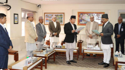 Chief Justice Raut administers oath of office to new NRB…