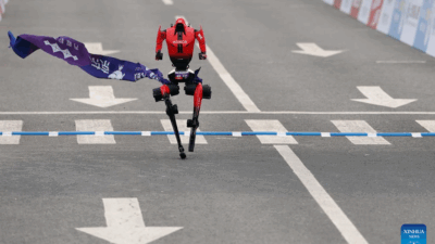 Humanoid robot surpasses human half-marathon world record in Beijing