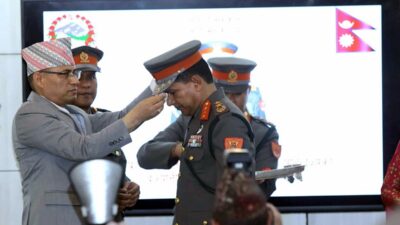 Home Secretary presents insignia to IGP Poudel