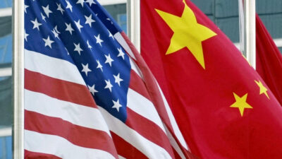 Beijing warns of trade war after US imposes 12.5% tariff